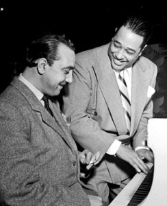 Django Reinhardt and Duke Ellington. Photo (and top): William Gottlieb.